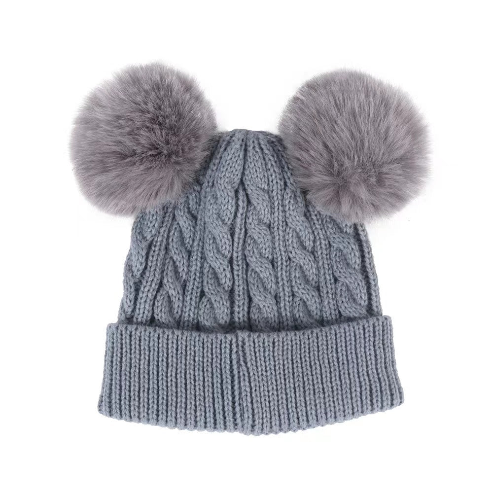 Gorro y calentador de cuello con pompón para bebé