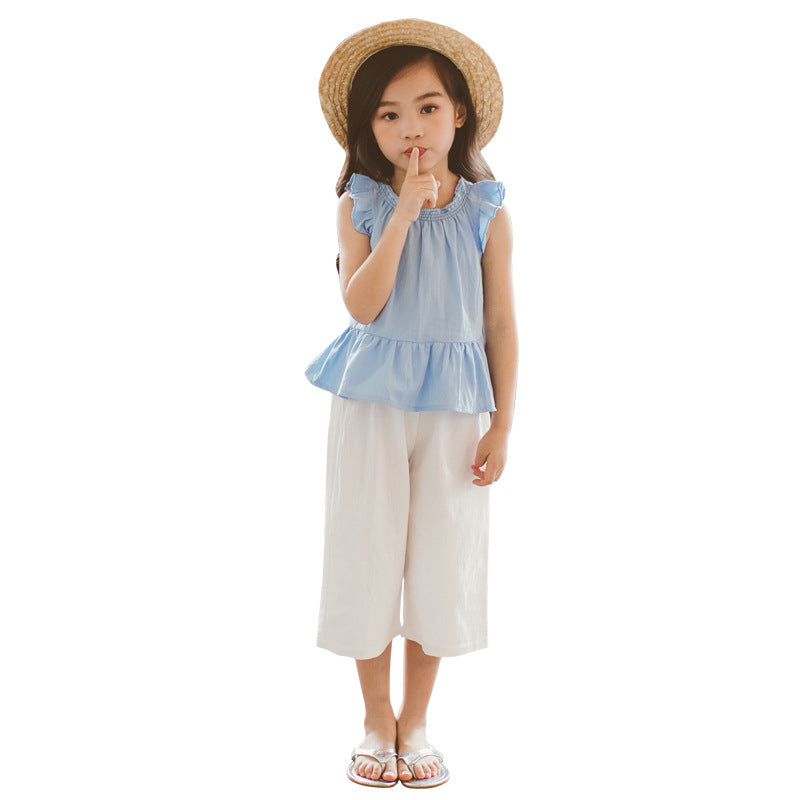 Set für Mädchen: blaues T-Shirt und weiße Hose