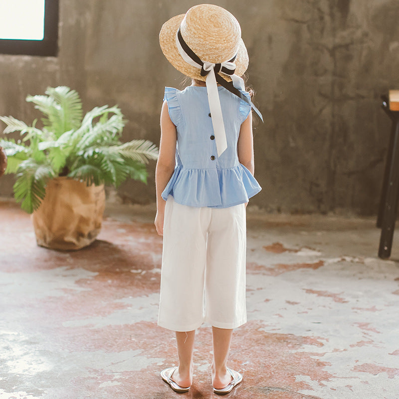 Set für Mädchen: blaues T-Shirt und weiße Hose