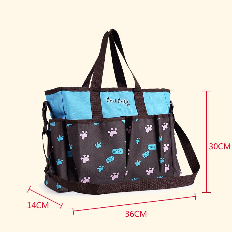Bolsa de pañales para madres jóvenes con múltiples bolsillos y gran capacidad.