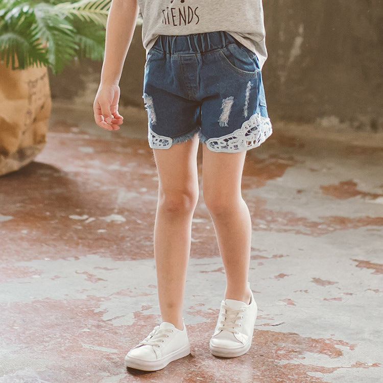 Shorts vaqueros para niña con detalle de encaje